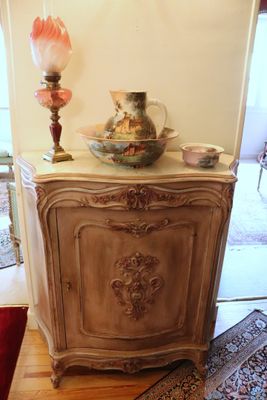 a table with a vase on top of it in a living room