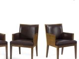 three brown leather chairs with wooden legs and arms on a white background