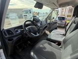 a view of the inside of a van from the driver ' s seat