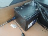 a computer and a mouse on the floor next to each other