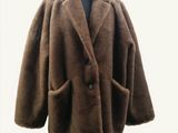 an image of a brown coat on a mannequin