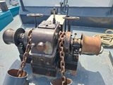an image of a boat engine on the deck of a boat