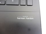 a close up of a laptop keyboard with the words sound by harmman / kardonn on it