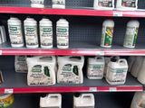 many bottles of cleaning products on the shelves in the store