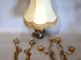 a lamp that is on a table with a lamp shade on it
