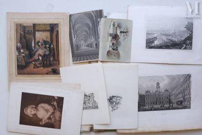 a lot of old photographs on the table