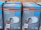 three boxes of garmin smart plugs sitting on top of each other