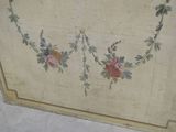 a painting on the wall of a room with flowers on it