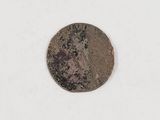 an image of an old coin on a white surface