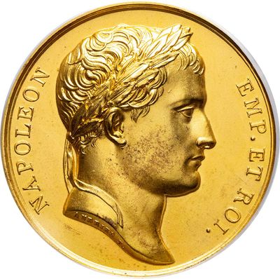 gold coin with a portrait of a man in profile on a white background
