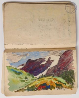 an open book with a drawing of a mountain scene on it