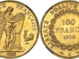 a gold coin with an image of a woman holding a bird