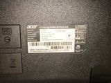 a label on the back of a laptop that is not working
