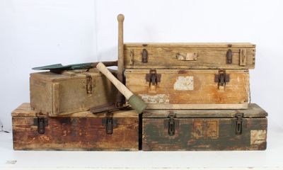 a pile of old suitcases stacked on top of each other