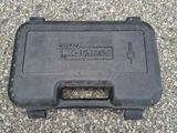 a black case that is sitting on the ground