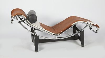 an image of a chaise lounge chair with a brown leather seat