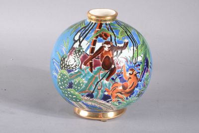 a blue vase with a picture of animals painted on it