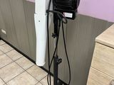 an image of a hair dryer on a stand in a room