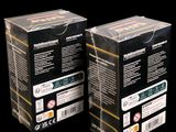 two boxes of the same product are shown on a black background