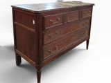 an image of a wooden dresser with marble top