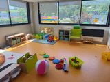 a room that has a lot of toys on the floor