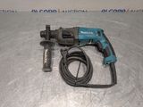 an image of a corded drill with a cord attached to it