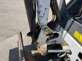 a close up of the front end of a skid steer