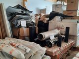 a room filled with lots of boxes and other items