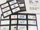 a lot of stamps in a folder on the table