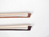 three different types of hair brushes on a white surface
