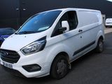 a white van that is parked in a parking lot