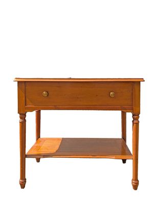 a small wooden table with a shelf underneath it
