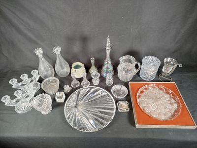 a lot of glass items that are on a table