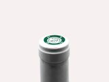 a bottle of wine that is sitting on a table