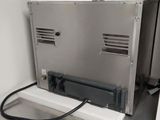 an image of a microwave that is in a kitchen
