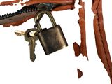 a broken padlock with a key attached to it
