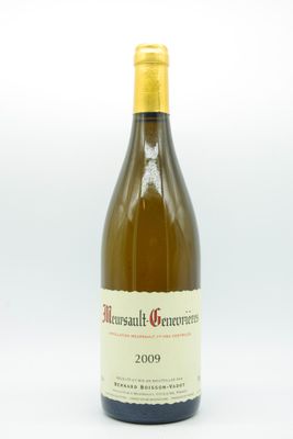 a bottle of wine that is sitting on a table