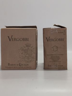two boxes of vergoobi wine sitting on a table