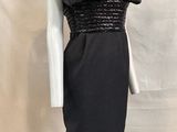 a mannequin dress with a black and white dress on a mannequin mannequin mannequin mannequin mannequin mannequin mann