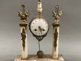 a clock that is sitting on top of a table