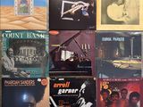 a lot of records that are on the floor