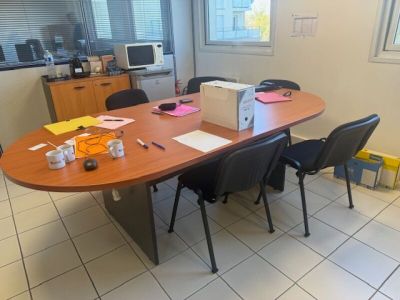 a table with a box on it in the middle of a room