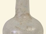 a white vase with a blue decoration on it