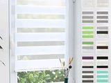 a picture of a window with blinds in it
