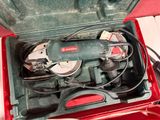 a tool in a case that is open on the floor