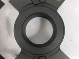 two circular cutters on a table with a white background