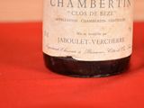 a bottle of wine that is sitting on a table