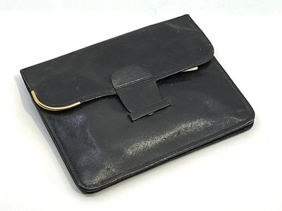 PUIFORCAT. Porte-nécessaire à couture de voyage en cuir noir…