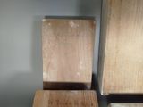two wooden blocks that are sitting next to each other