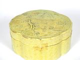 an image of a yellow box sitting on top of a white surface